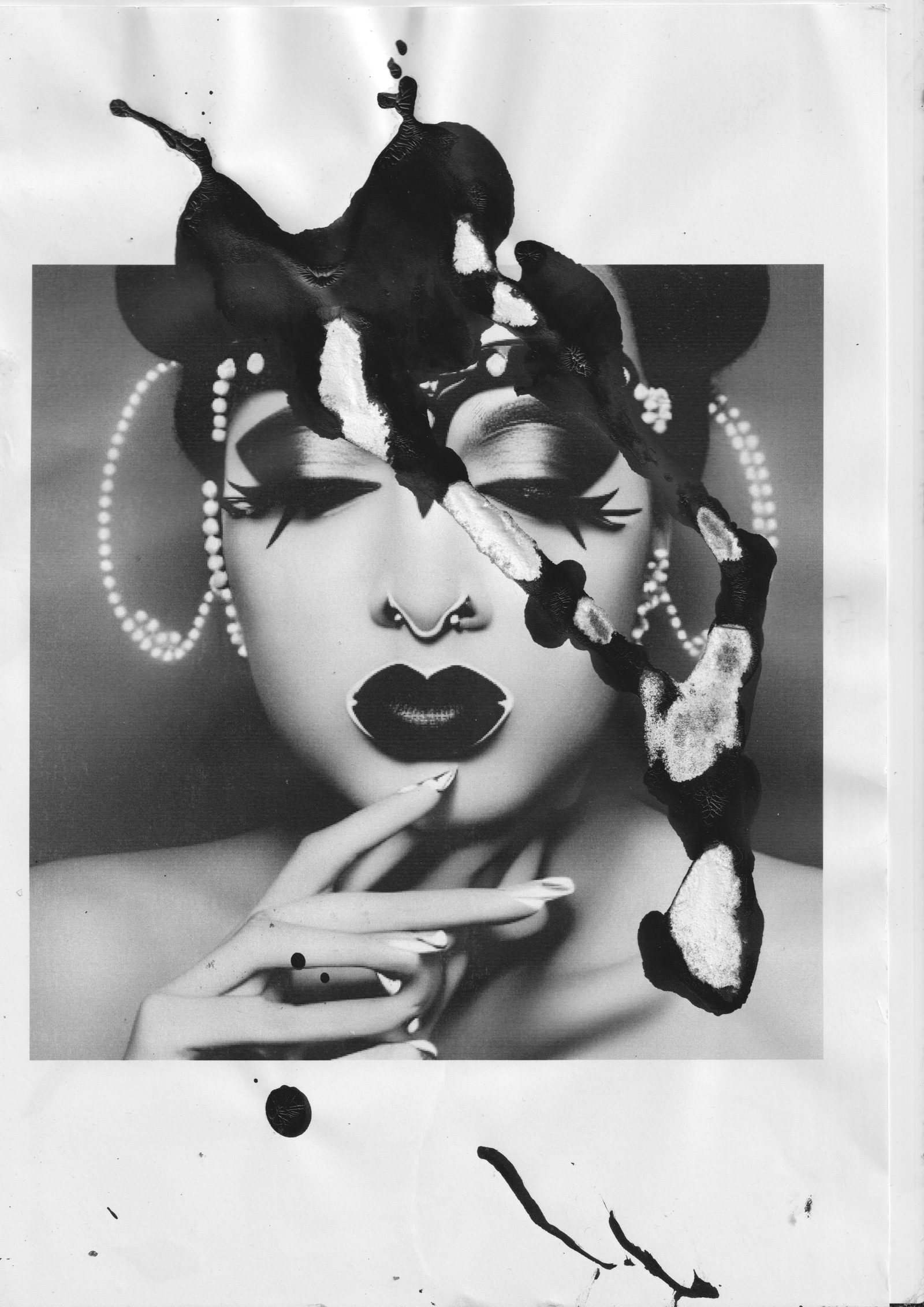 One of the inked Soul Brds sheets, black ink poured over a print, 2022